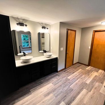 Remodeled bathroom with basin sinks