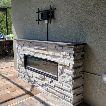Outdoor fireplace that the TV will be mounted on top of