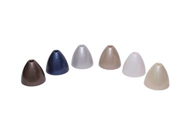 Six cone-shaped plastic covers in various neutral colors.