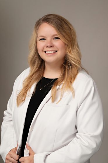 Medical professional smiling at camera