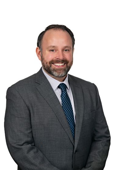 Business professional smiling at camera