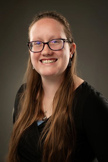 Business professional smiling at camera