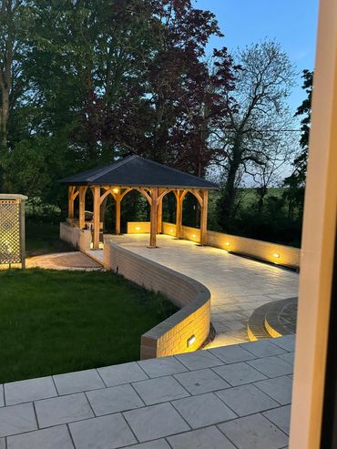 Bespoke handcrafted summer pergola with slate roof in Cavendish