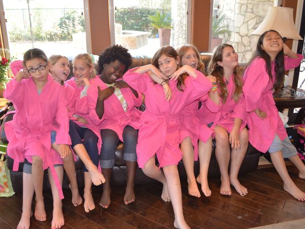spa party girls with pink robes