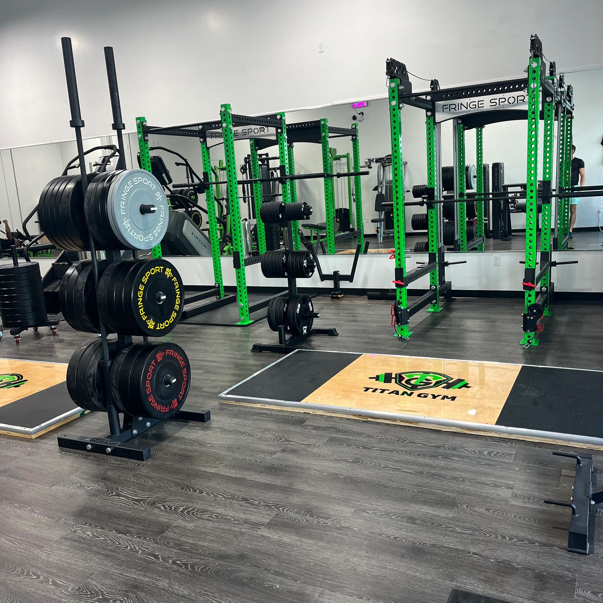 Titan Gym's squat racks and deadlift platforms.
