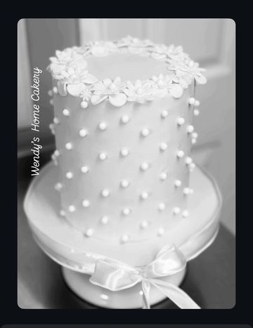 White wedding cake with pearls