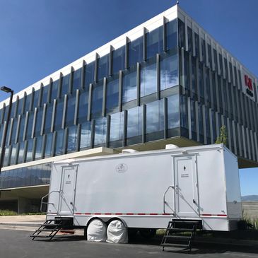 8 stall white portable toilet trailer for corporate event in Lehi Utah