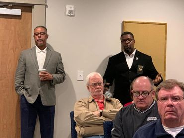 Henry County residents listening to presentations