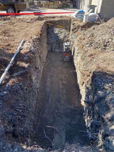 in ground propane tank installation excavation compacted line to house