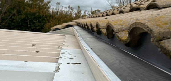 rain gutter cleaning rain gutter repair rain gutter installation rain gutter screening rain gutters