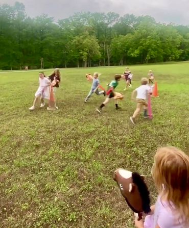 Hobby horse race during Spring Fling at Rebecca Creek Park