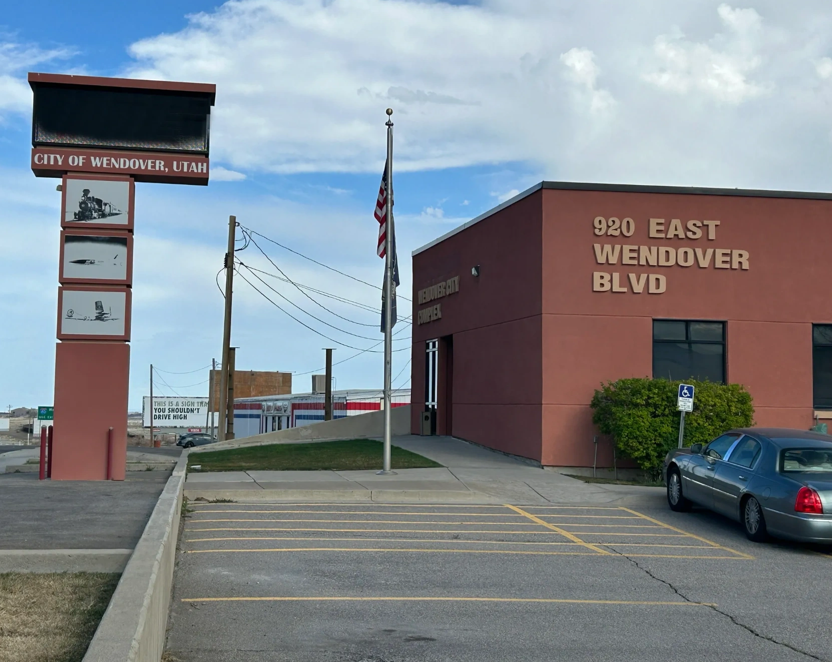 City complex and sign in Wendover, Utah under a clear sky.