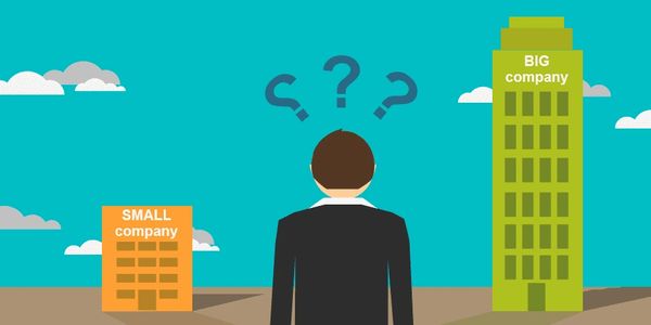 Person confused choosing between small and big company buildings.