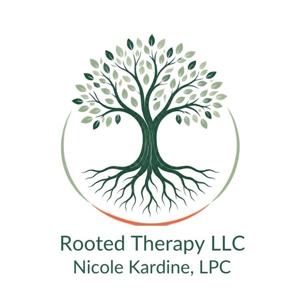 Logo of a tree with roots for a therapy service.