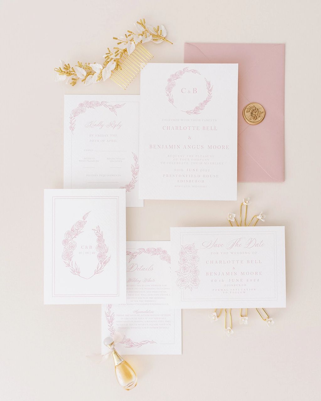pink floral wedding invitations with a wax seal and gold bridal hair accessory