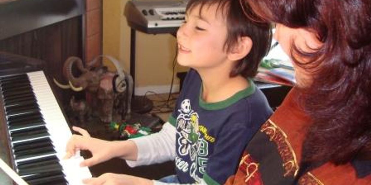 He learns how to play piano at preschool piano lessons in Happy Valley, OR