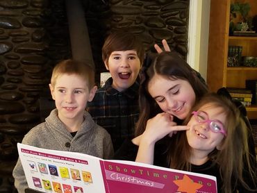 Getting ready for our online recital. Since Covid, we have been doing virtual Recitals. Some student