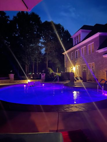 Swimming pool with blue elegant lighting