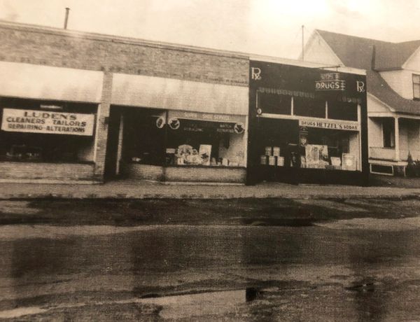 Image: two storefronts from 1923