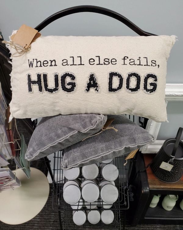 Image: assorted gifts showcasing pillow with saying When all else fails, hug a dog