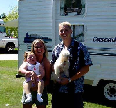 Family posing together outdoors