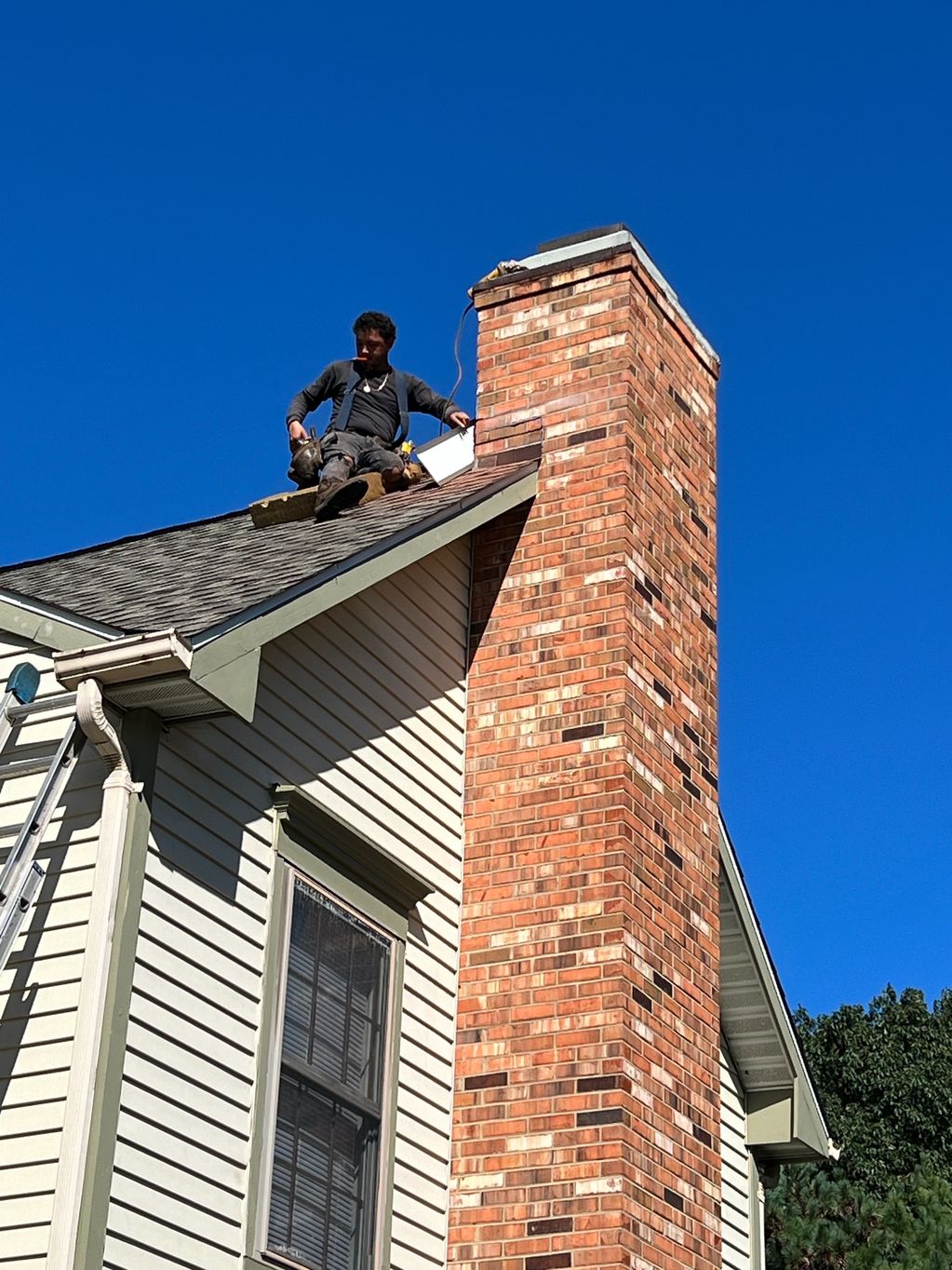 Making sure to correctly flash a chimney during a roof replacement is critical