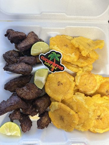 Fried beef chunks with tostones