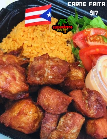 Fried pork chunks with rice and salad