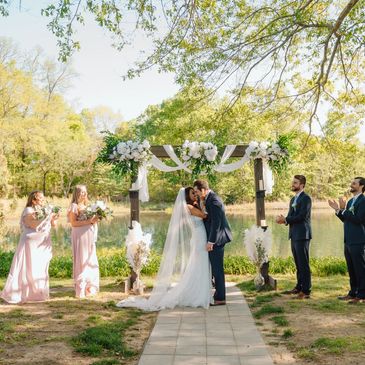 Gorgeous pondside ceremony setup.