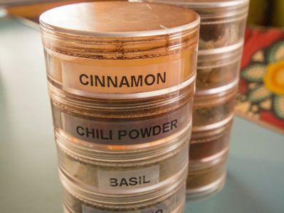 Stackable Spice Containers, one of our favorite RV kitchen hacks.