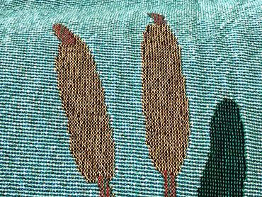 Close up of weaves on cattails and leaves