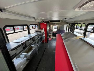Converted Bus Interior with Food Work Stations