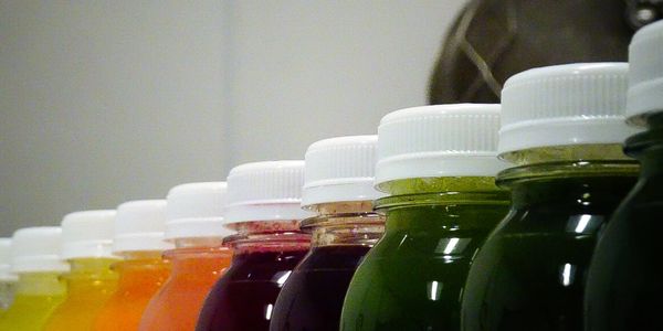 A colorful array of our juices available for purchase.