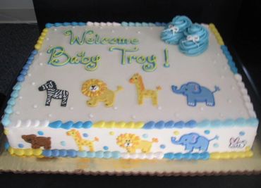 An animal themed cake to welcome baby troy