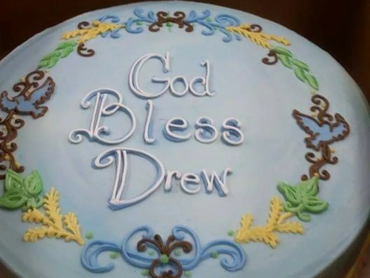 God bless drew cake in blue color 