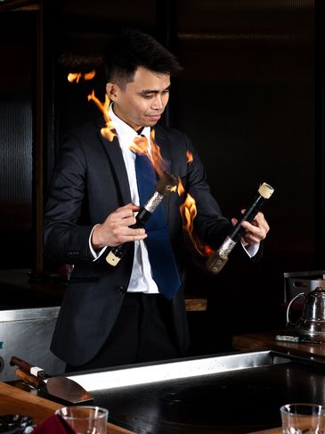 KIWAMI Teppanyaki chef doing a cooking performance