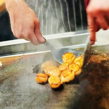 Chef cooking a japanese cuisine