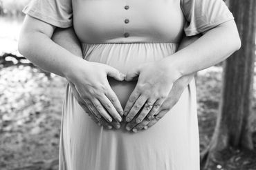 Couple heart pose Moonbeam Photography