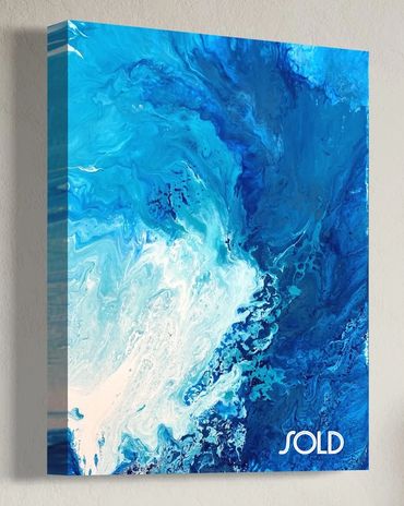 Abstract blue and white fluid art painting labeled as sold.