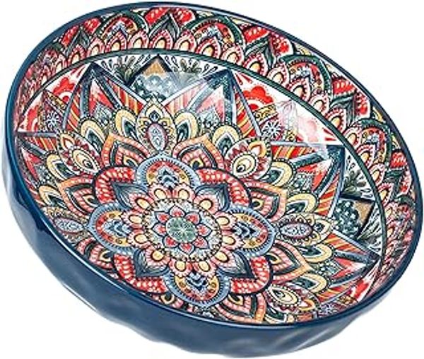 Colorful ceramic bowl with intricate mandala design.