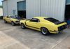 1969 and 1970 Yellow Boss 302 Mustangs