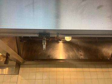 Photo of cleaning a commercial kitchen exhaust system