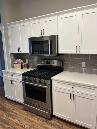 Kitchen Cabinet refinish and install
