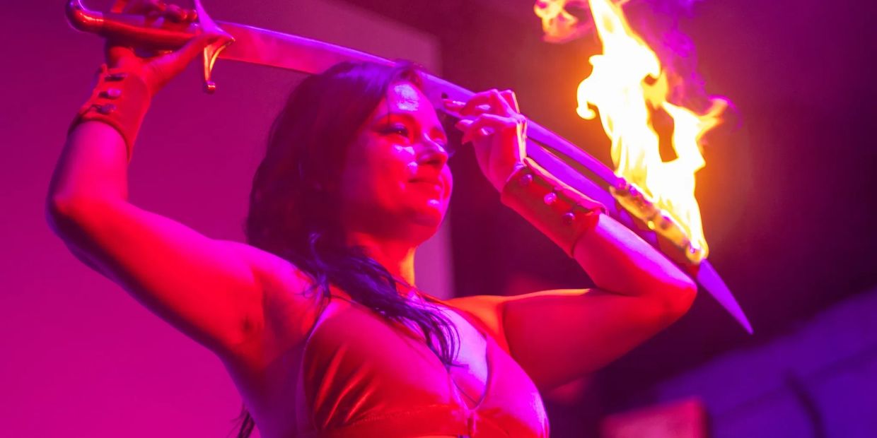 Fire sword belly dancer Malia Delapenia