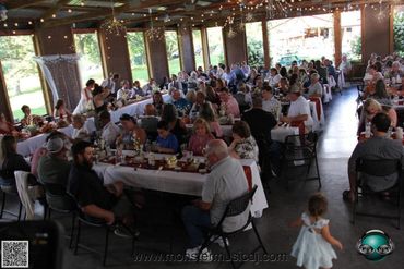 Family and friends attending a private event in the pavilion.