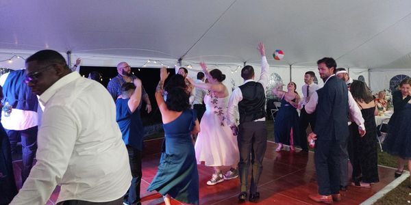 Dylan and Dani, what a wedding!! Everyone loves when we throw out the beach balls..