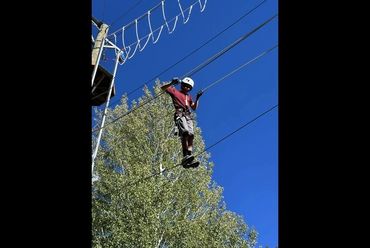 student on challenge course at Ophir Canyon Education Center