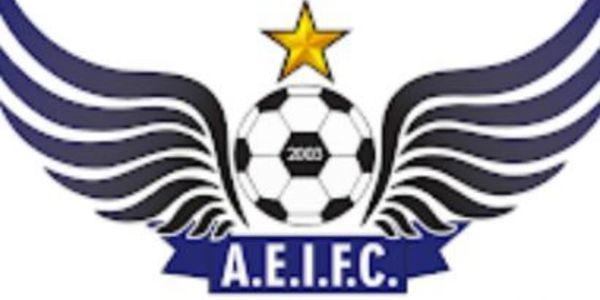 A.E.I.F.C. logo with a soccer ball, wings, and a star.
