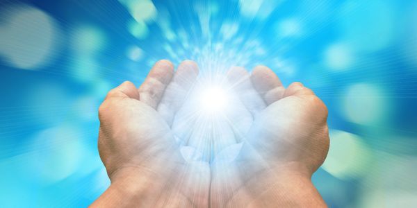 Reiki energy healing Healing Touch light in hands