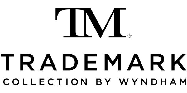 Logo of Trademark Collection by Wyndham, a stylish hotel brand.